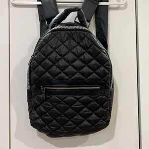 Sol and Selene black backpacks